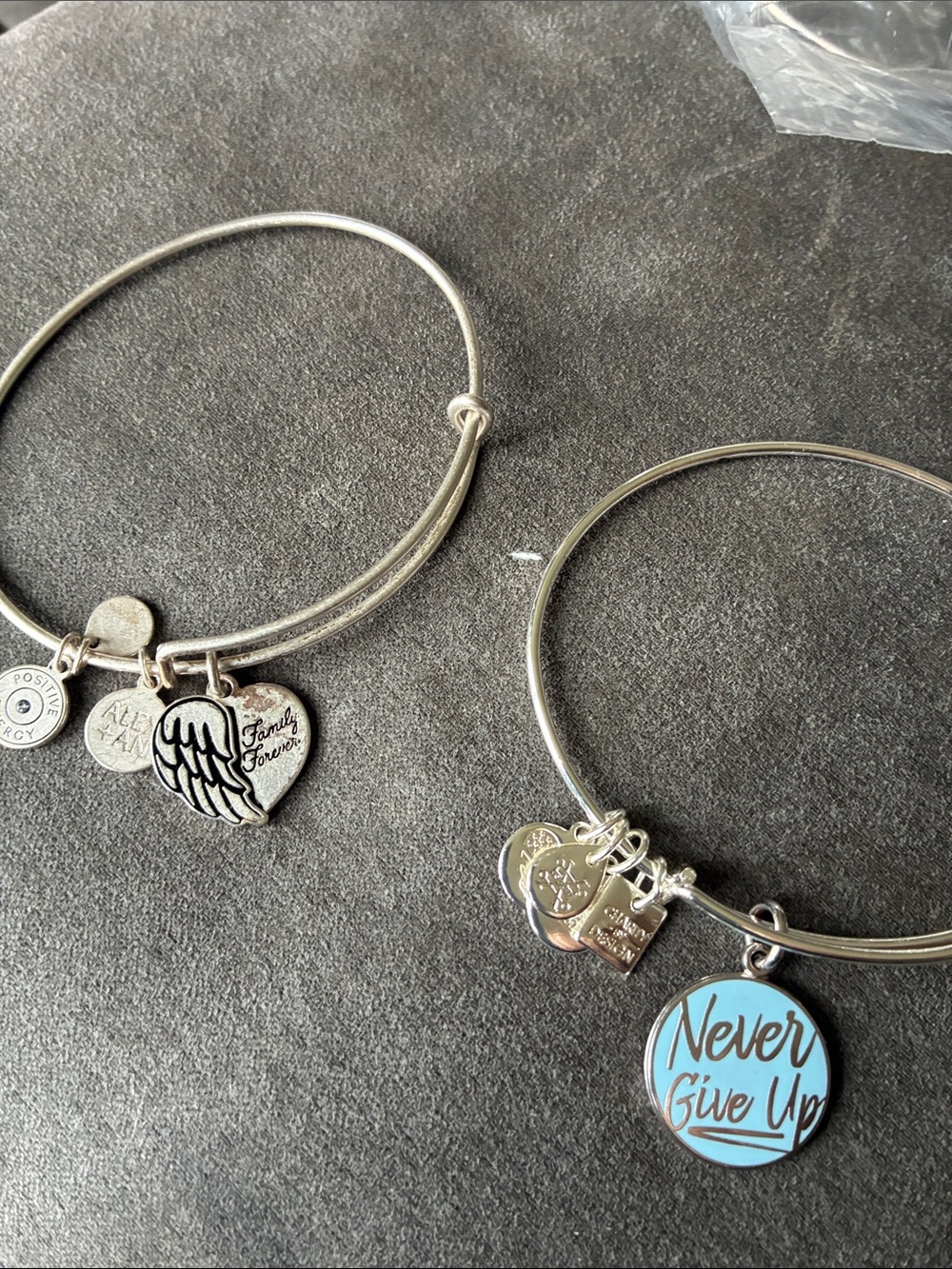 Alex and Ani Silver Tone Charm Bangle Bracelets with Blue 'Never Give Up' Charm